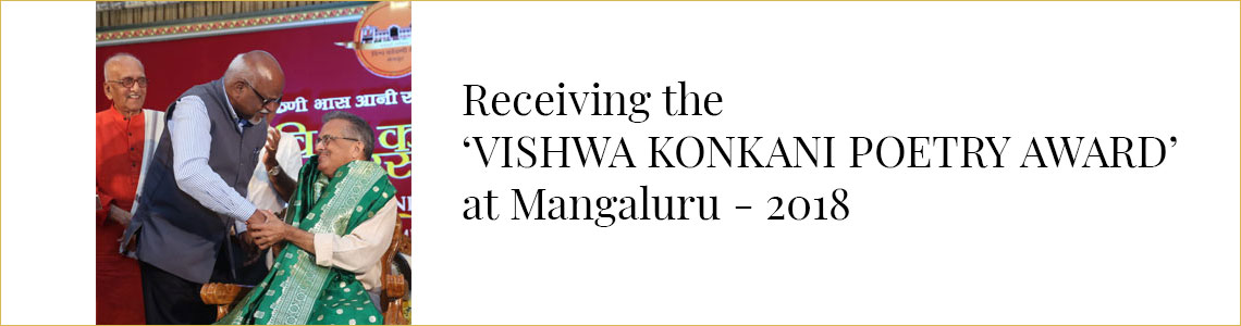 Receiving the ‘Vishwa Konkani Poetry Award’ at Mangaluru